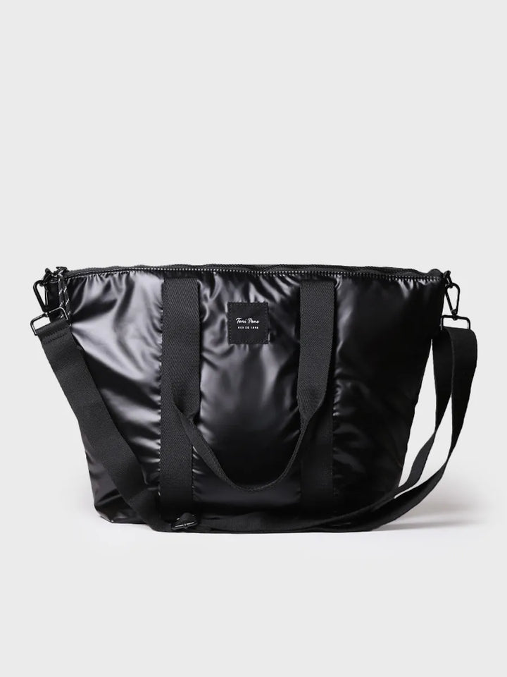 Complementos - Bolso para mujer en material acolchado negro brillante | GINNY - Toni Pons