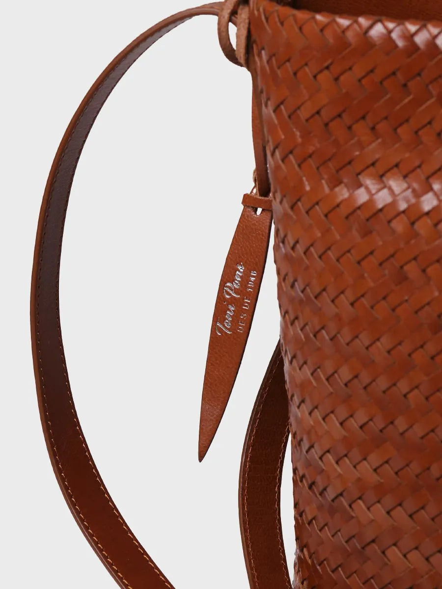 Complementos - Bolso bombonera en cuero trenzado con tira ajustable | SALLY - Toni Pons