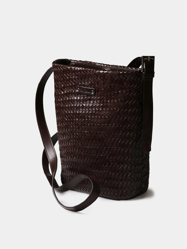 Complementos - Bolso bombonera en cuero trenzado con tira ajustable | SALLY - Toni Pons