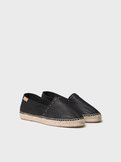 Flat women's espadrille in leather with studs