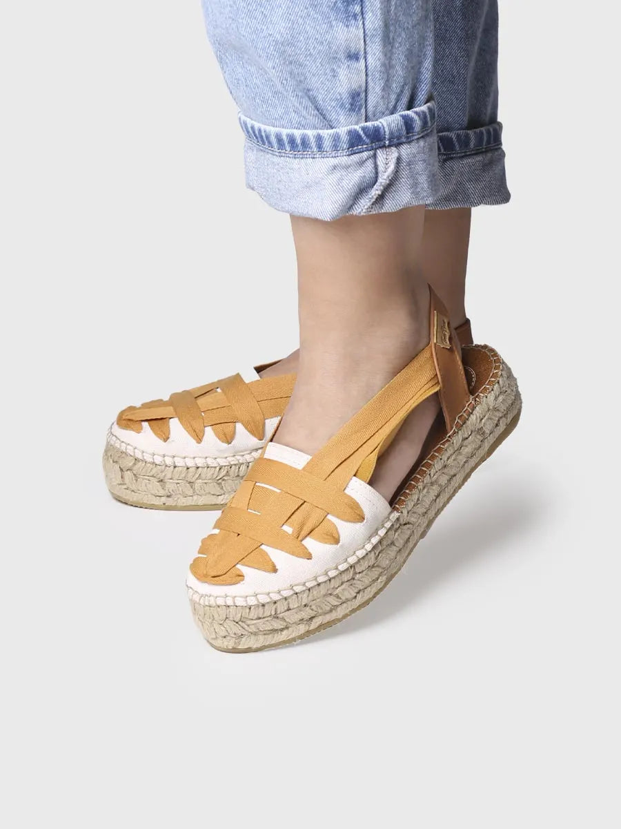 Flat espadrilles with crossed straps